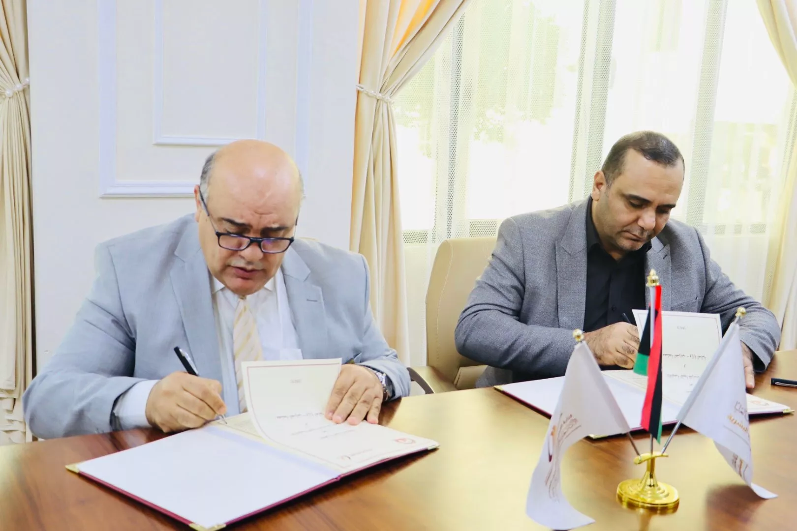 مراسم توقيع اتفاقية تعاون مشترك بين الأكاديمية الليبية للدراسات العليا و مصلحة الضرائب بوزارة المالية.